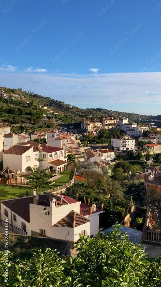 Panoramic view of village in the beginning of the Natural Park of Tejeda, Almijara and Alhama in Malaga, Andalusia, Spain Panoramic view of village in the beginning of the Natural Park of Tejeda, Almijara and Alhama in Malaga, Andalusia, Spain