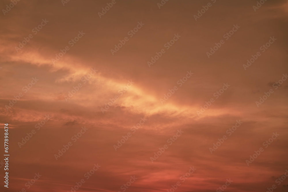 Red orange glowing sky highlighted by Sunset, tropical Thailand. Close up photo.