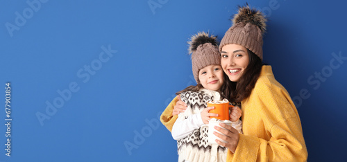 Woman and her little daught...
