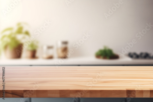 Empty wooden table and blurred modern minimalist kitchen interior with wooden table and green plants background