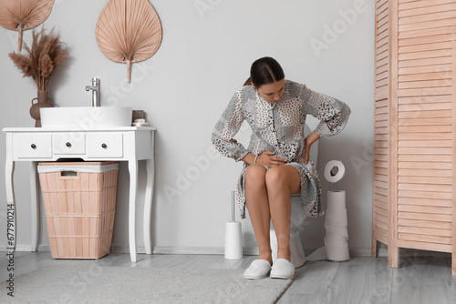 Young woman suffering from ...