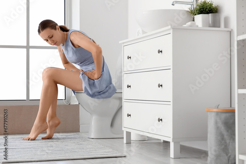 Young woman suffering from ...