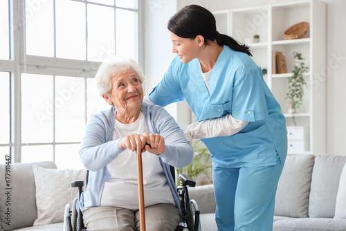 Senior woman in wheelchair ...