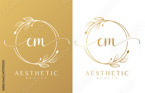 Letter CM Beauty Logo with Flourish Ornament
