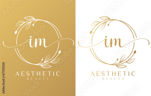Letter I and M Beauty Logo with Flourish Ornament