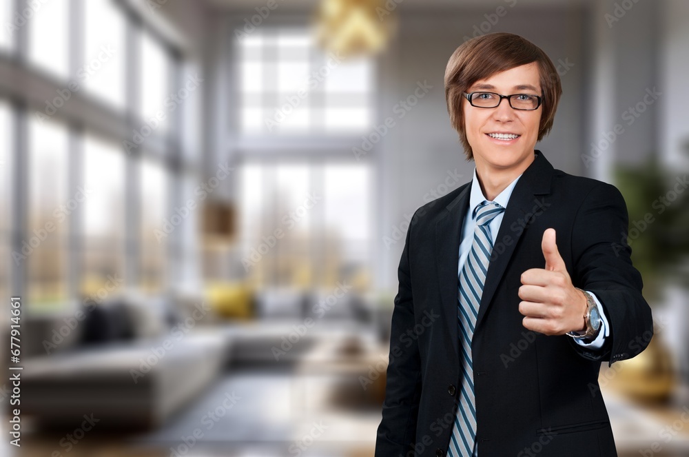 Happy confident business man professional in office Happy confident business man professional in office