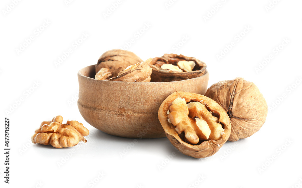Bowl of tasty walnuts on white background Bowl of tasty walnuts on white background
