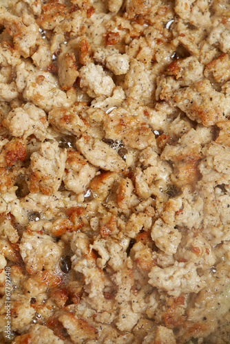 Close-up photograph of Thanksgiving stuffing being cooked. Gourmet food recipe.