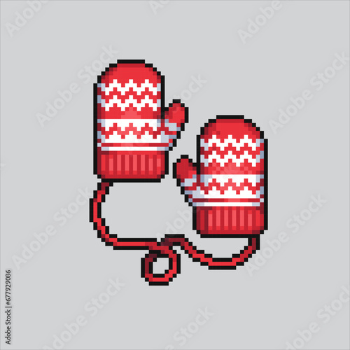 Pixel art illustration Christmas gloves. Pixelated Christmas gloves. Christmas warm gloves pixelated for the pixel art game and icon for website and video game. old school retro.