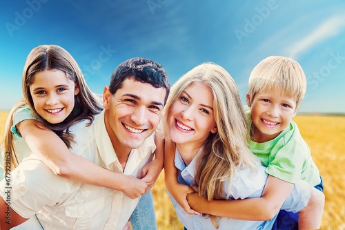 Happy family with children running on nature background