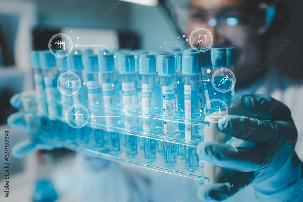 Chemist is chemically analyzing test tubes, Scientist is experimenting with chemicals in the laboratory, Chemist is separating compounds in test tubes with chemical reagents. Chemist is chemically analyzing test tubes, Scientist is experimenting with chemicals in the laboratory, Chemist is separating compounds in test tubes with chemical reagents.