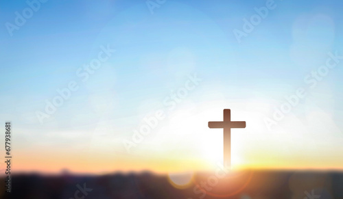 Canvas Print hristian cross on hill outdoors at sunrise