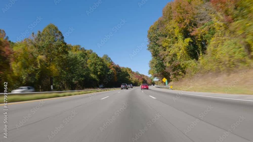POV driving a car on mountain highway, autumn scenery with colorful trees POV driving a car on mountain highway, autumn scenery with colorful trees