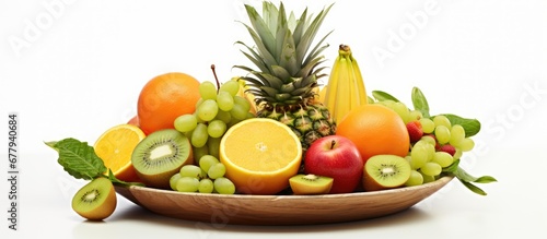 isolated white background a plate of healthy tropical fruits is positioned showcasing their vibrant green colors rich in vitamins and nutrition offering a perfect snack option for those on a