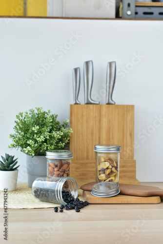 jar with kitchen utensils