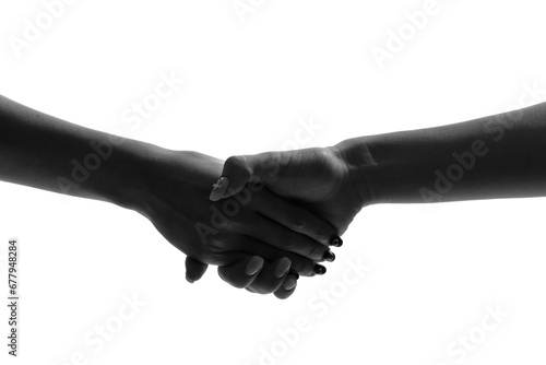 握手する二人の女性のシルエット photo