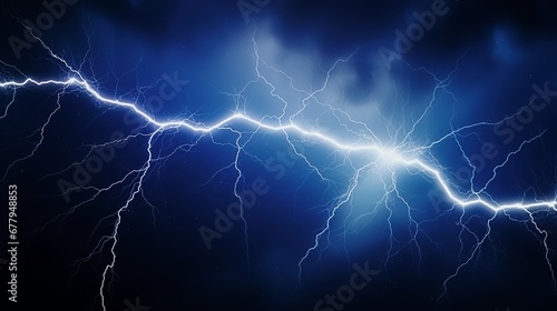 Shaft of lightning isolated on a blue-black background photo