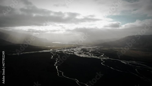 aerial thor valley, glacial river flowing through black volcanic floodplain, thorsmörk dramatic scenery moody landscape Iceland photo
