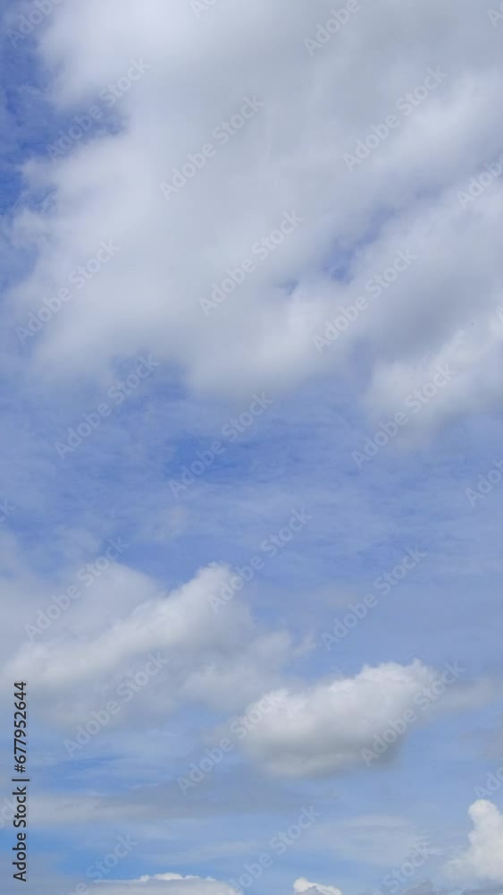 Blue sky with fluffy cloud time lapse on a sunny day 4k footage. Blue sky with fluffy cloud time lapse on a sunny day 4k footage.
