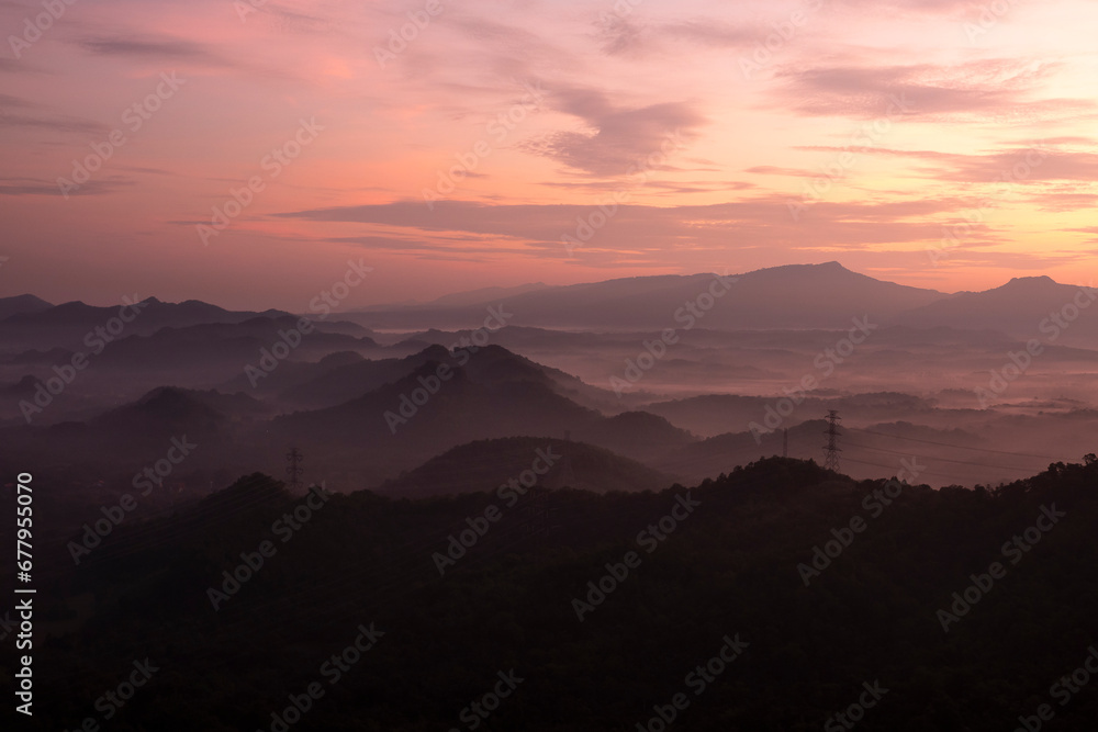 High mountains a beautiful sky at a sunset viewpoint and a lot of water vapor create a sea of mist High mountains a beautiful sky at a sunset viewpoint and a lot of water vapor create a sea of mist