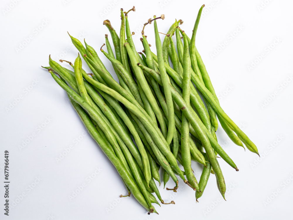 Bunch of long green beans isolated on white background, flat lay. Bunch of long green beans isolated on white background, flat lay.