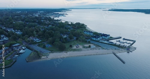 Aerial Drone shot of Orient Greenport North Fork Long Island New York before sunrise with ferry and houses photo