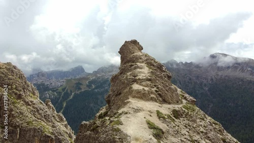 Dynamic drone reveal mountain scenery, Italian mountains, Europe. Dramatic sky. photo