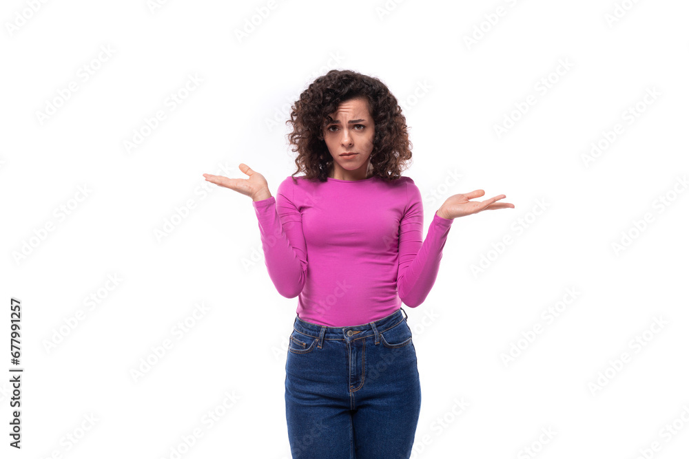 young fashionista curly brunette lady dressed in a fresh lilac color turtleneck on a white background young fashionista curly brunette lady dressed in a fresh lilac color turtleneck on a white background