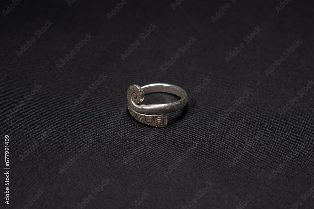 Hmong silver jewelry on black background, Handmade silver accessories Hmong silver jewelry on black background, Handmade silver accessories