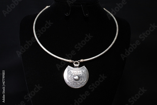 Hmong silver jewelry on black background, Handmade silver accessories