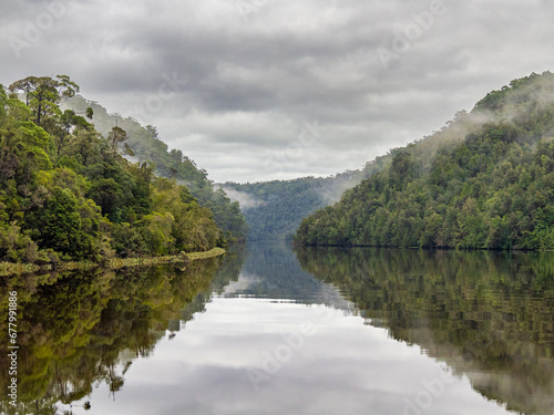 Morning g mist and cloud reflections on the Pieman River, Tasmania