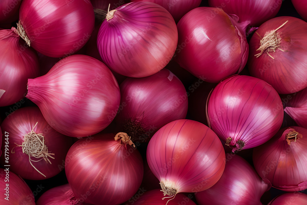 Close uo of many raw whole red onions