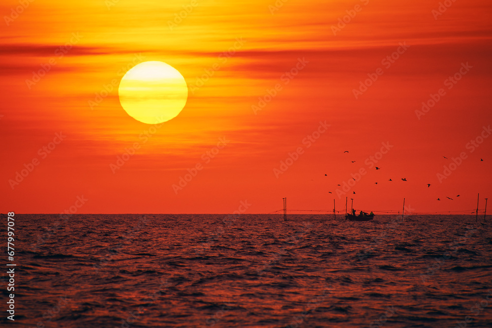 sunrise with a fishing boat on the Black Sea