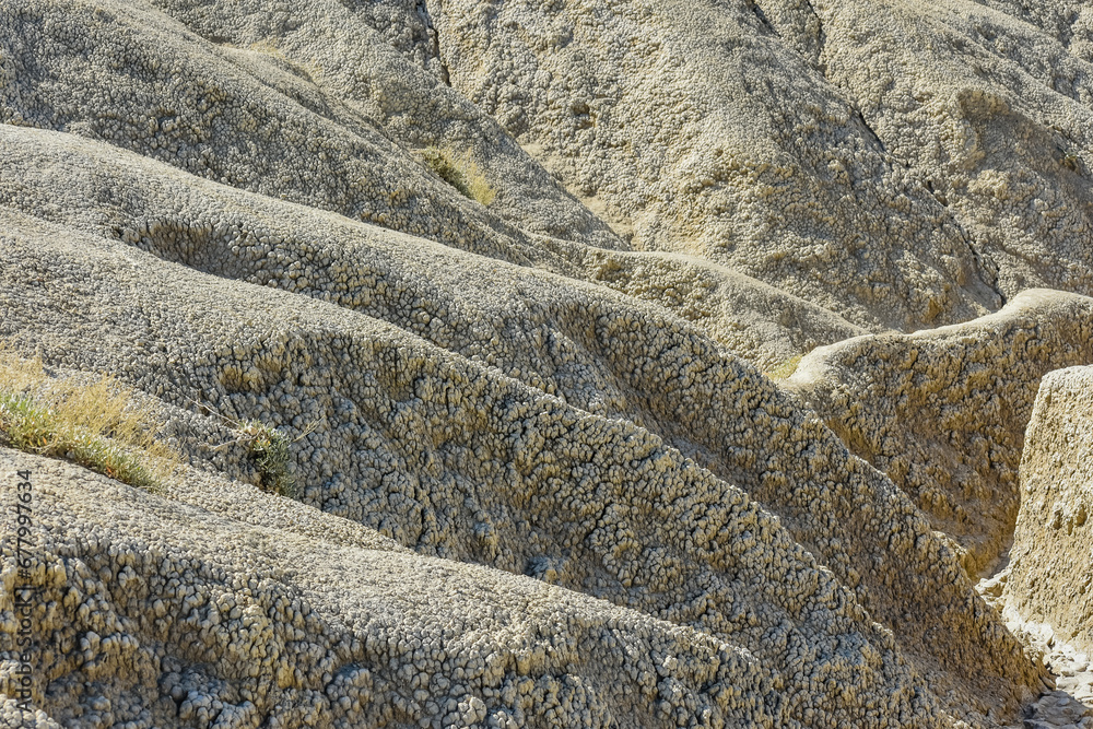 cones of mud volcanoes from which rivers of mud flow