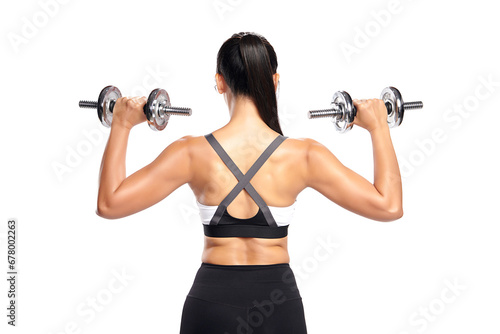 an asian woman is working out with dumbbells wearing the sport exercise suit with white background,