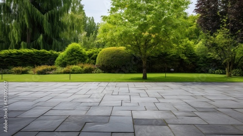 Garden landscape design with pathway intersecting bright green lawns and shrubs white sheet walkway in the garden. Landscape design with colorful shrubs. grass with bricks pathways. lawn care service. photo