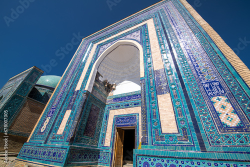 Symmetrical decorative ornament of entrance to the tomb in Shah-I-Zinda photo