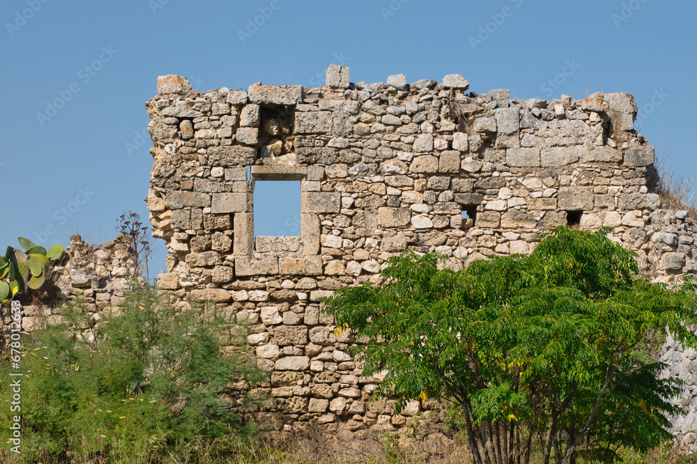 Ruin wall at the old church of San Leonardo di Siponto, a small former abbey church in Manfredonia, Apulia, Italy