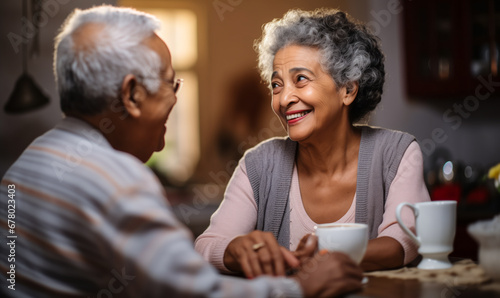 Ethnic Senior Couple: Heartwarming Coffee Moments in Kitchen