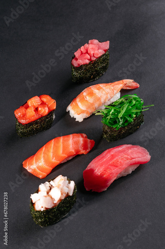 Set of traditional japanese food on a dark background.