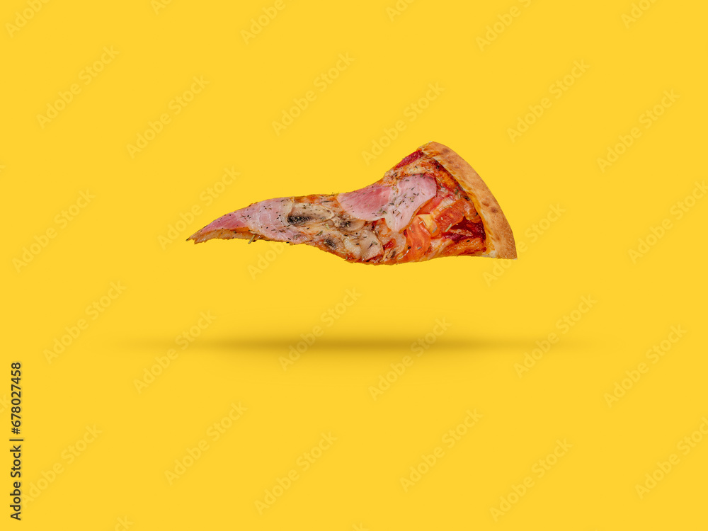 Obraz premium a flying slice of pizza on a yellow background