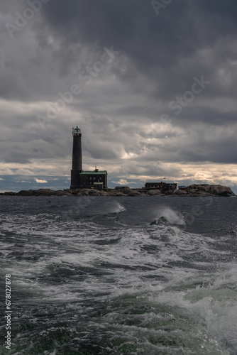 Bengtskar lighthouse on the coast during a storm in the Baltic Sea © Cavan