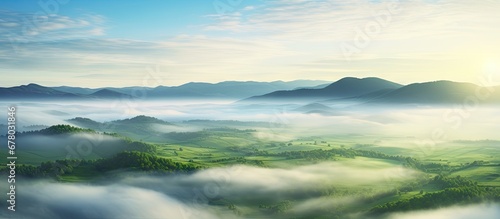 Europe s stunning aerial view of a green field at sunrise obscured by enchanting fog Copy space image Place for adding text or design © Ilgun