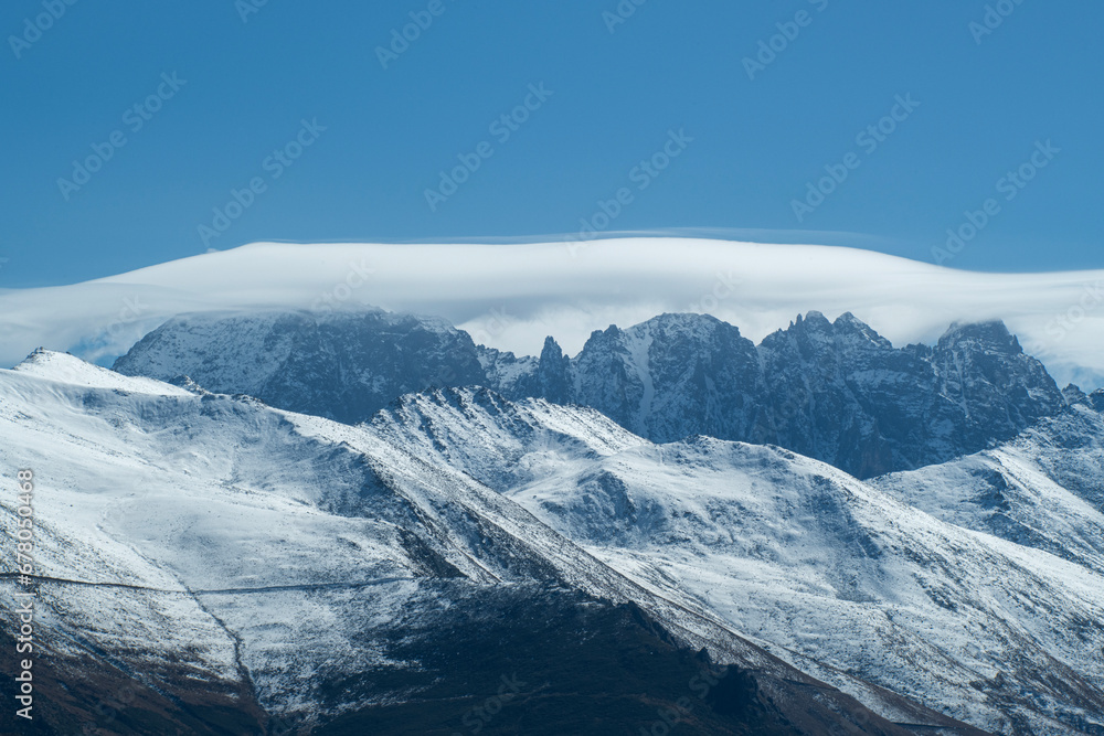 Foggy and snowy mountain landscape. Mountains covered with fog and clouds. Snow-capped hills. Snow-covered forest landscape. Black Sea mountains. Pokut Plateau. Kackar Mountains. Rize, Türkiye.