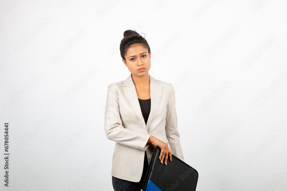 Corporate office lady holding a folder and giving presentation. Young woman in formal wear wearing white blazer giving different expressions with a folder in her hand Corporate office lady holding a folder and giving presentation. Young woman in formal wear wearing white blazer giving different expressions with a folder in her hand