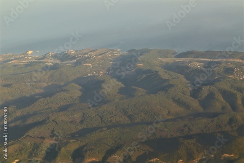 Aerial view of forests and mountains along the Black Sea in Istanbul, Turkey.
The photo is taken from the window of the plane after take-off from Istanbul Sabiha Gokcen International Airport (SAW). photo