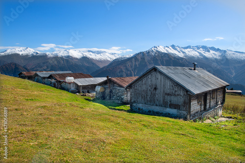 Highland houses made of stone and wood. Wooden plateau houses built on the hill. Historical highland houses. Sal Plateau Rize. Wooden plateau houses in Turkey. Sal Plateau Rize Türkiye. 