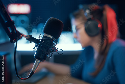 Radio presenter working and professional microphone photo