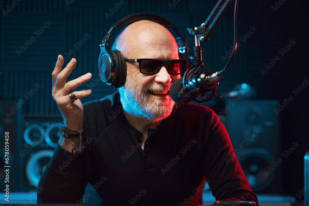 Radio presenter talking into the microphone Radio presenter talking into the microphone
