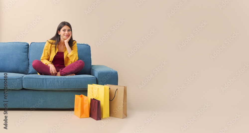 Happy woman at home with shopping bags Happy woman at home with shopping bags